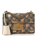 GG Supreme Monogram Berry Textured Dollar Calfskin Small Padlock Shoulder Bag Beige Ebony Light Copper Mystic White